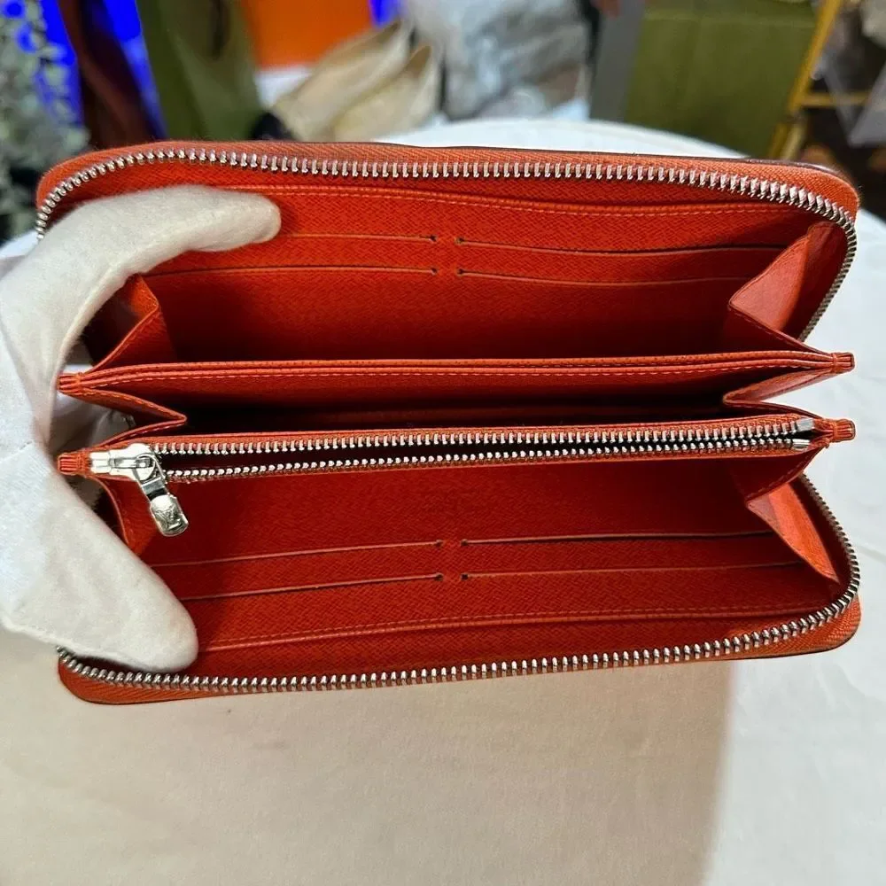 LOUIS VUITTON Long Wallet Epi Zippy Orange Women's Men's Leather